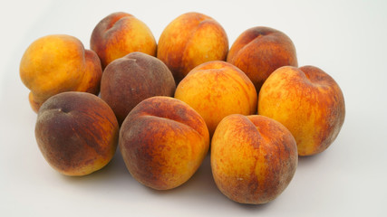 Peaches on a white background