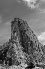 landscape of a bare mountain peak during summer on italian alps. black and white
