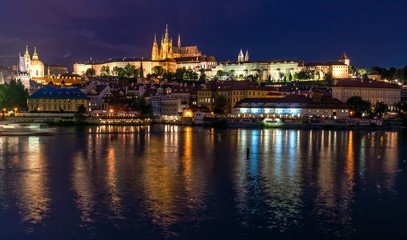 Prague castle and Vltava river at night
