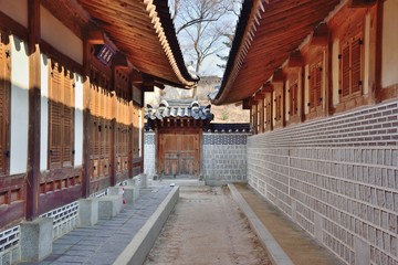 corridor between traditional architectures in gyeongbokgung, Kor