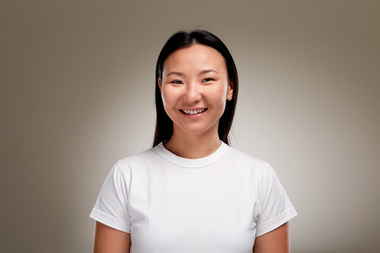 Portrait of young smiling asian woman