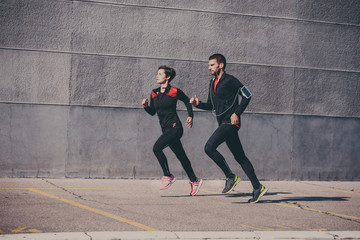 Couple running in an urban environment