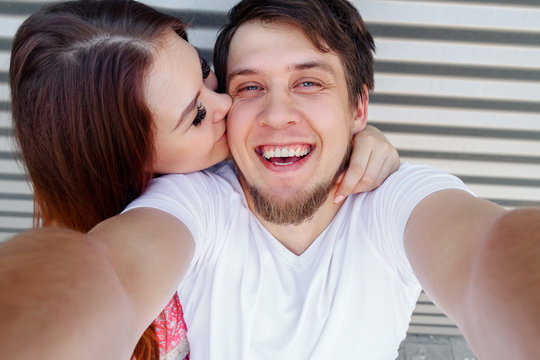A young couple making selfie