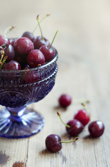 Bowl of cherries, selective focus