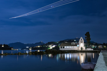 Fototapeta premium Night scene of a church in Corfu island, Greece, near the airport