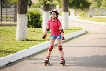 Girl rides on roller skates