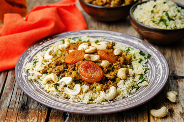 Spiced mince with dried apricots, cashew nuts and couscous. Moro