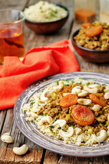 Spiced mince with dried apricots, cashew nuts and couscous. Moro
