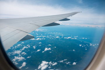 Fototapeta na wymiar Sky view from airplane window