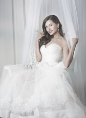 Fototapeta na wymiar beautiful bride in wedding dress, studio