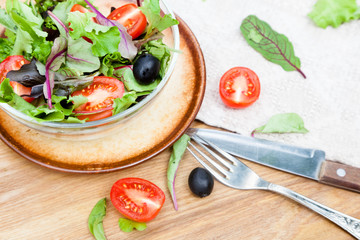 vegetable salad with cherry tomatoes and olives