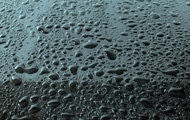 rain drops on a black background