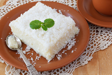 Sweet couscous (tapioca) pudding (cuscuz doce) with coconut