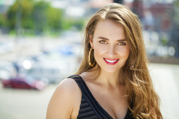 Portrait close up of young happy beautiful woman