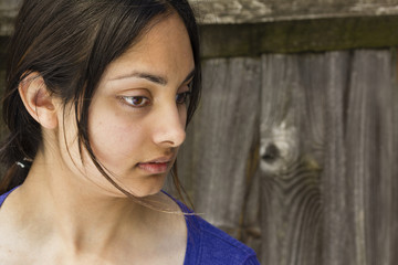 Fototapeta premium A young woman thinking