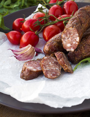 Smoked sausage with greens and tomatoes 