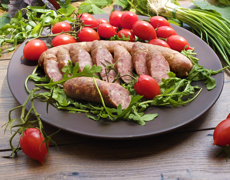Smoked sausage with greens and tomatoes 
