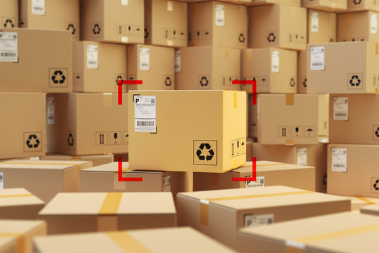Warehouse storage, packages delivery concept, focus on cardboard box purchase and background with stack of parcels