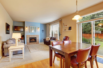 Modern dinning room with connected living room.