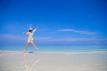 Young woman enjoy tropical beach vacation