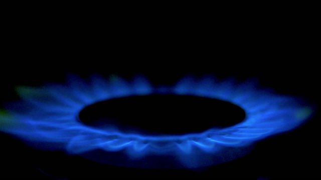 gas burning from a kitchen gas stove in slow motion. High speed 250fps.