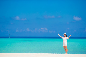 Fototapeta na wymiar Young woman enjoy tropical beach vacation