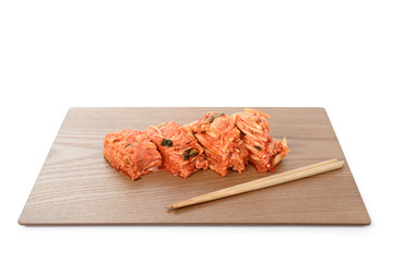 Red Gimchi on a wooden plate