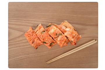 Red Gimchi on a wooden plate