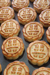 fresh mooncakes on a baking pan