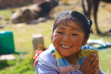 Aymara girl laughing - obrazy, fototapety, plakaty