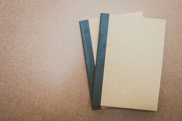 Fototapeta premium Notebook mock up on wood background