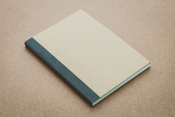 Fototapeta premium Notebook mock up on wood background