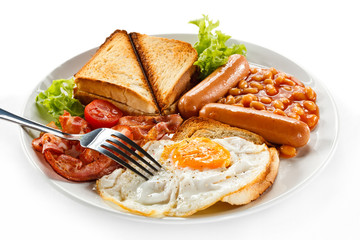 English breakfast - toast, egg, bacon and vegetables 