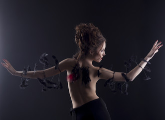 Beautiful Fallen Angel with skeleton of wings