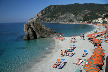 Beach of Monterosso Al-Mare, one of five famous fisherman villages Cinque Terre, in summer