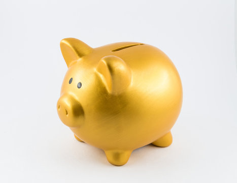 Piggy bank in gold color on left side