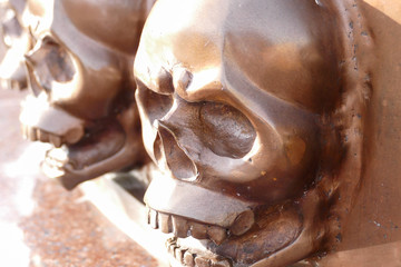 brown metal skull sculpture