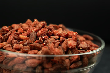 Dried goji berries on the table.