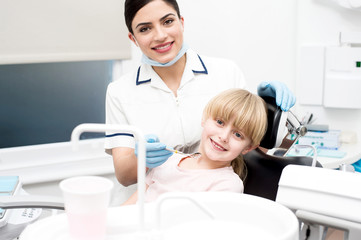 Fototapeta premium Complete dental checkup for girl