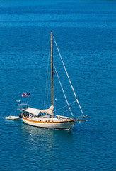 Fototapeta premium American Sailboat on Brilliant Blue Water
