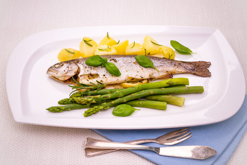 Grilled trout, rosemary potatoes, green asparagus