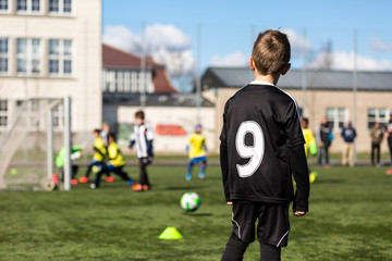 Fototapeta premium Young boy during soccer match