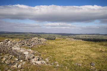 Abandoned buildings of copper mines in landscape in Peak Distric
