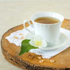 Jasmine tea with jasmine herb flower on wooden table