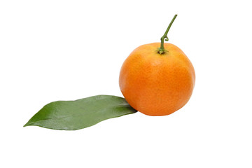 Mandarin and green leaf taken closeup.Isolated.
