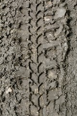 Trace of tires on a dirt road closeup