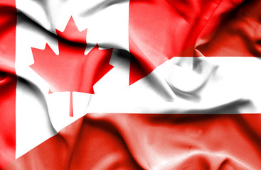Waving flag of Austria and Canada