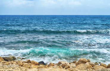 Fototapeta na wymiar Beach and the blue sea. Paphos, Cyprus.