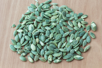 Pumpkin seeds  on wooden table