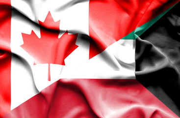 Waving flag of Kuwait and Canada